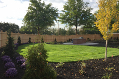 The plan comes together with the new planting beds and sod lawn areas.