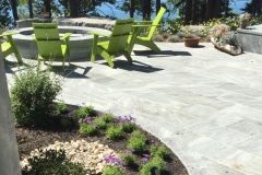 The oceanfront patio has large planting beds for seasonal interest.