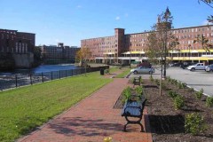 Completed view of Phase 1, with benches, trash cans, and wrought iron fence installed.